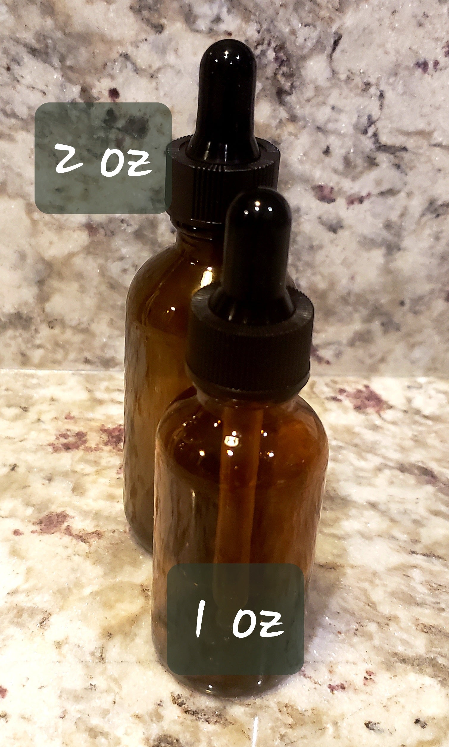 Assorted Tincture Treasures Sample Pack #3 with three 1 oz tincture bottles arranged on a wooden surface